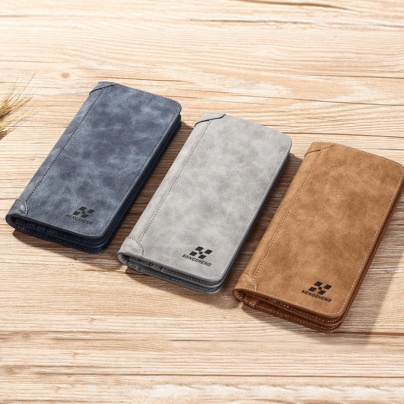 محفظة رجالية طولية (Long Wallet) من ماركة هينجشينج (Hengsheng)، وتتميز بتصميمها الشبابي على النمط الكوري الحديث، ومظهرها الكلاسيكي المطفأ (Frosted Leather) الذي يشبه الجلد المخملي