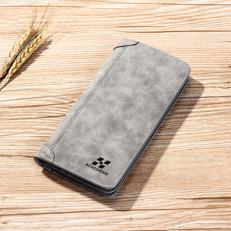 محفظة رجالية طولية (Long Wallet) من ماركة هينجشينج (Hengsheng)، وتتميز بتصميمها الشبابي على النمط الكوري الحديث، ومظهرها الكلاسيكي المطفأ (Frosted Leather) الذي يشبه الجلد المخملي